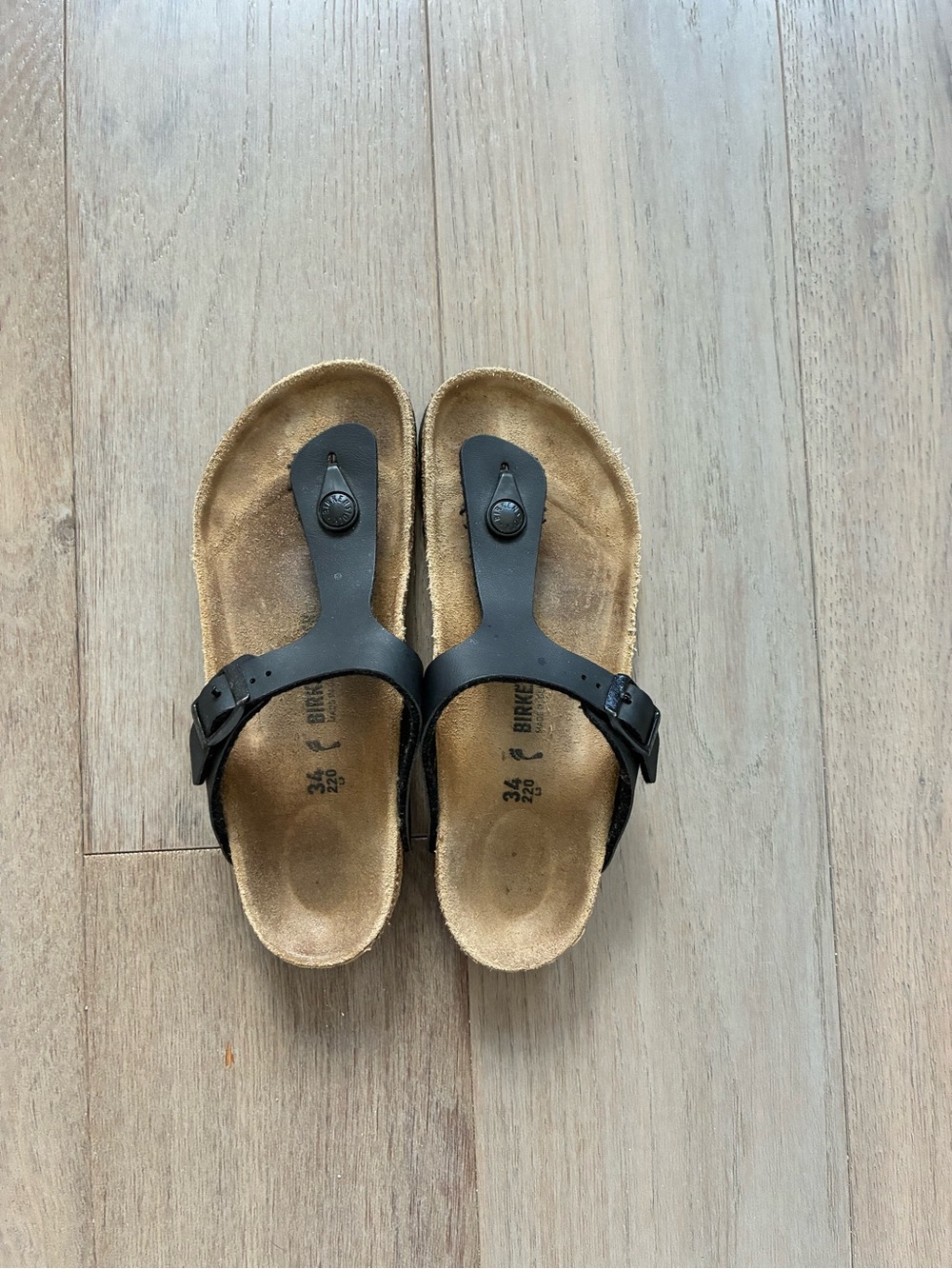 Birkenstock Black Toe-Post Sandals with Tan Footbed
